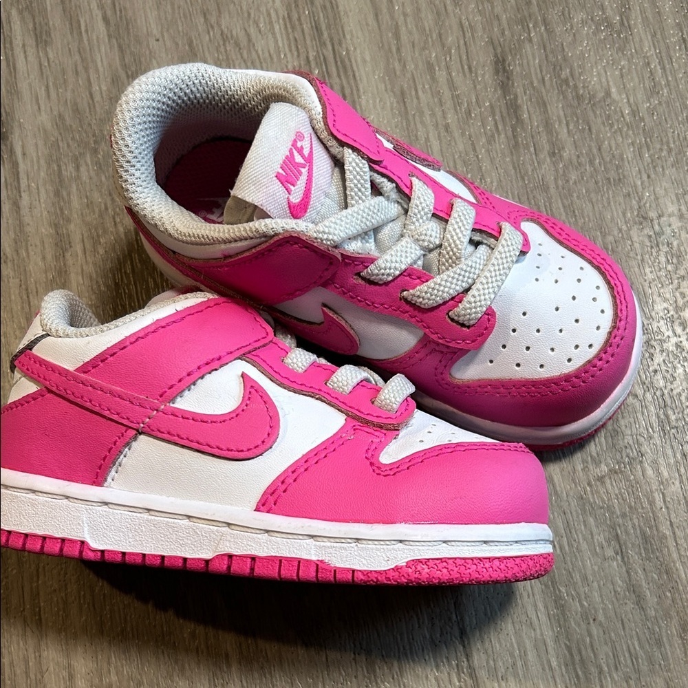 Nike Kids White and Hot Pink Low-Top Sneakers.